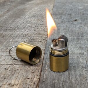 gold peanut lighter lit